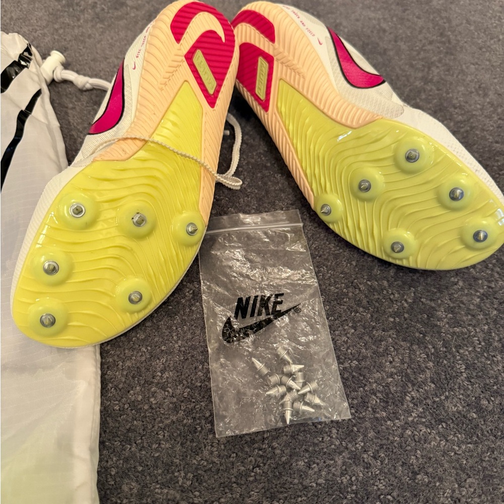 Nike Cleats with Yellow and Pink Accents
